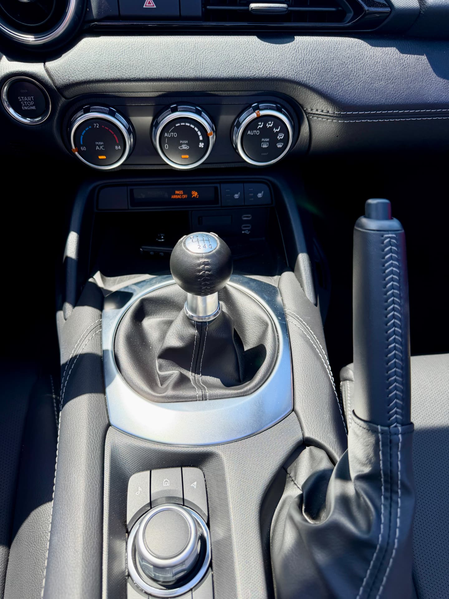 Mazda Miata manual gear lever, handbrake and climate controls